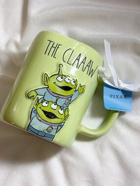 Rae Dunn Toy Story Disney Pixar "The Claaaw" Green Mug NWT